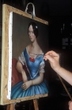 artiste en train de peindre un portrait